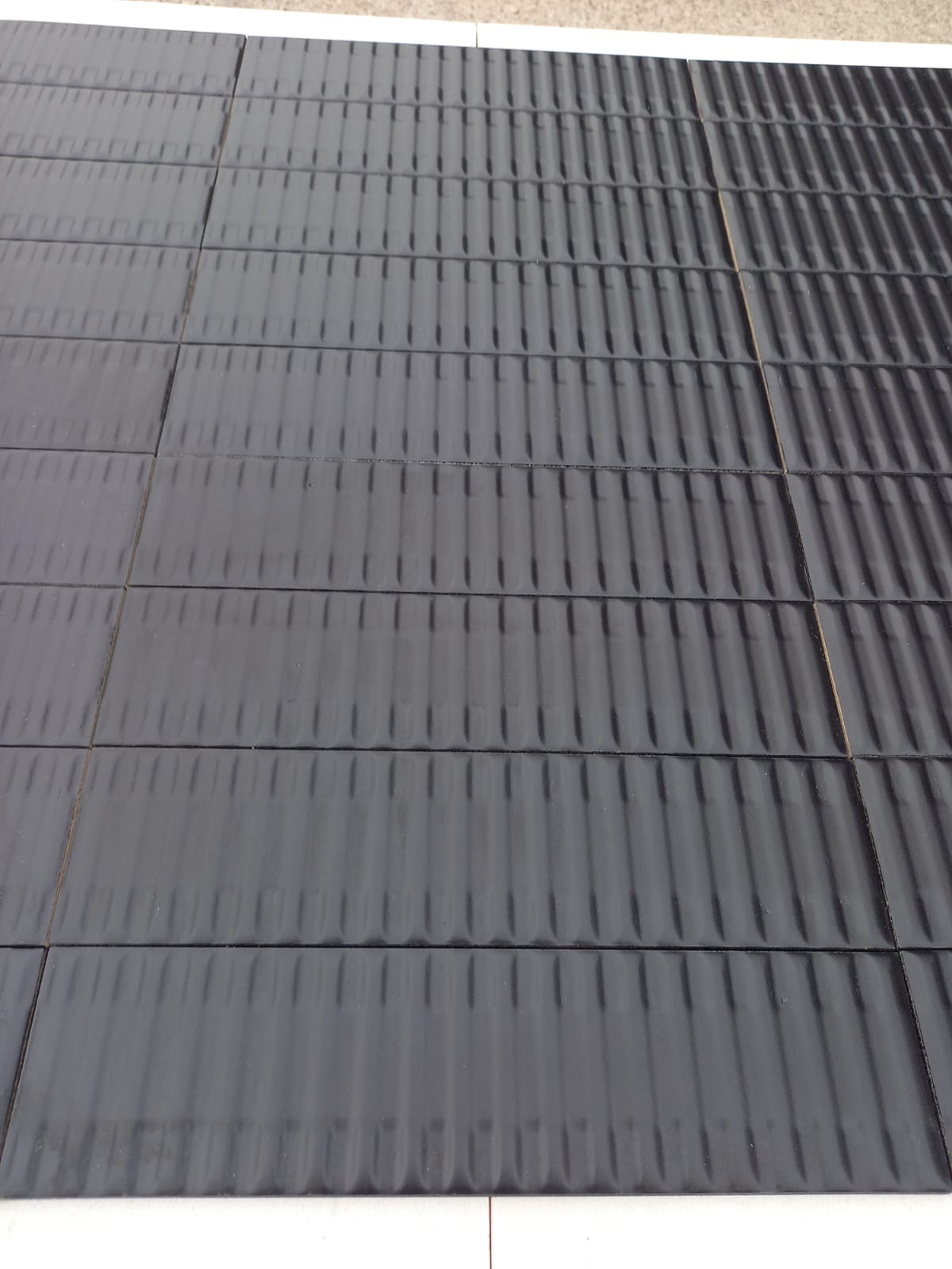 Piastrelle 7.5x30 Regoli nero stick