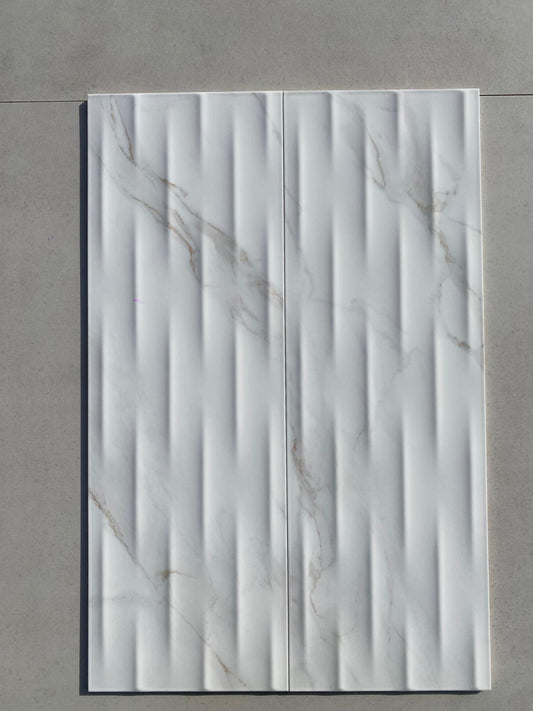 Piastrelle 25x75 Motif Extra calacatta gold lucido in rilievo