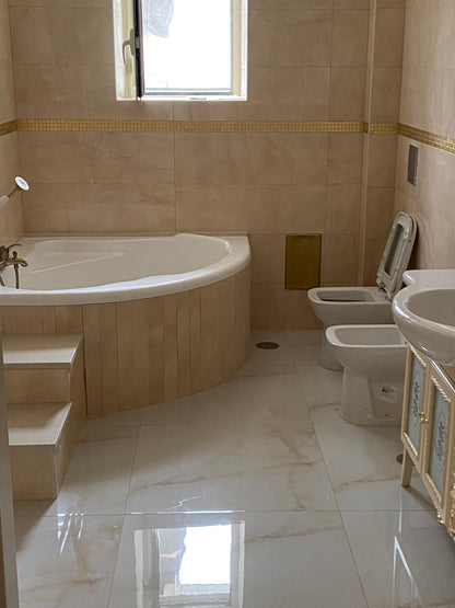 Piastrelle 30.5x91.5 Delux beige marmo rettificato lucido
