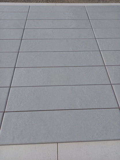 Piastrella 7.5x30 Regoli grigio glossy