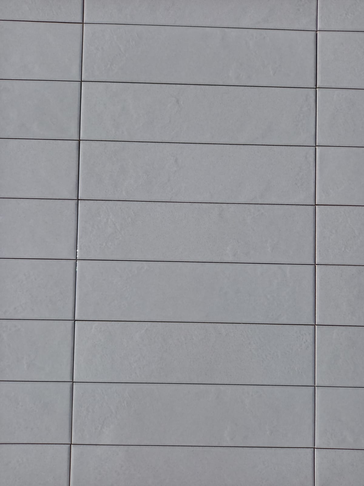 Piastrella 7.5x30 Regoli grigio glossy