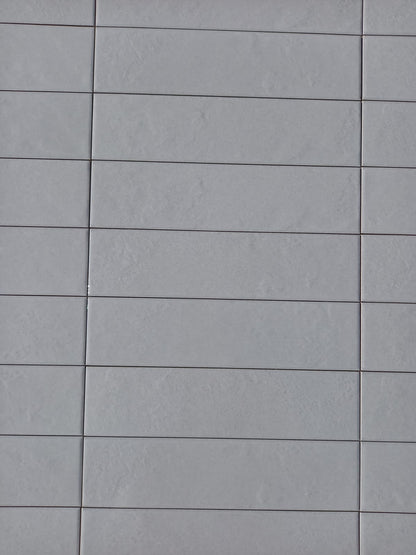 Piastrella 7.5x30 Regoli grigio glossy