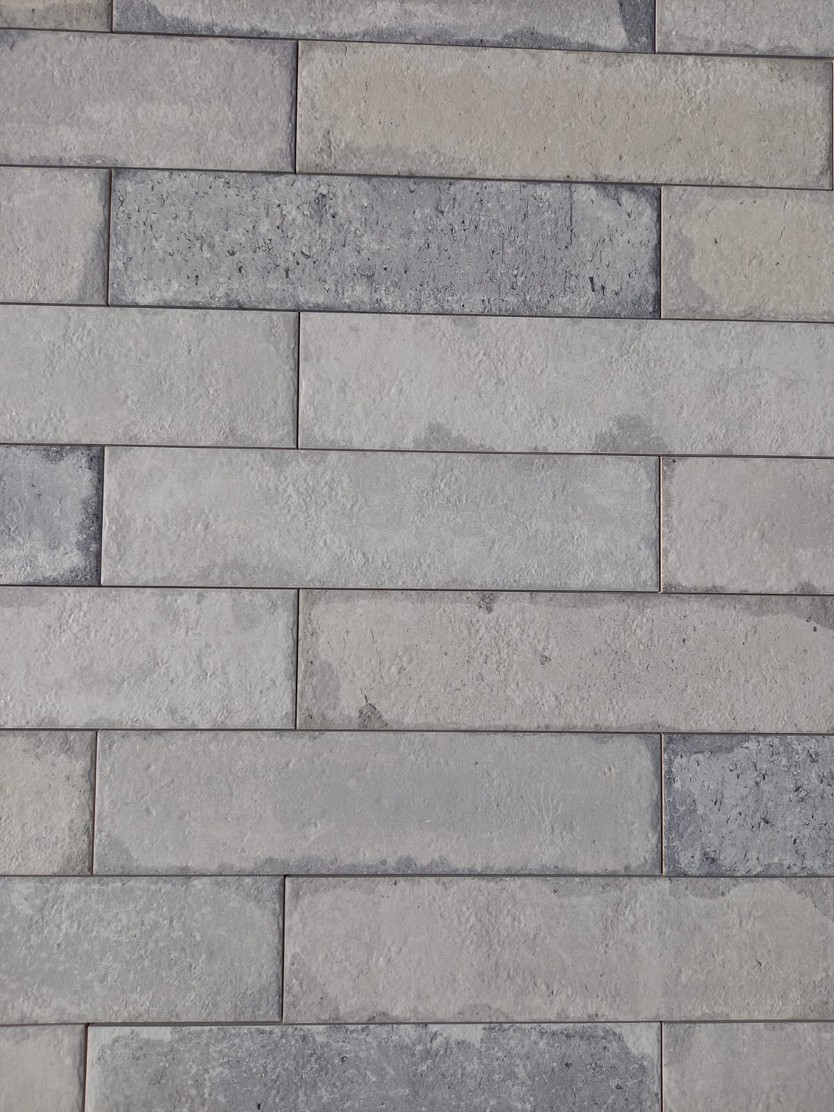 Piastrella 7.5x30 Bricklane bianco sfumato