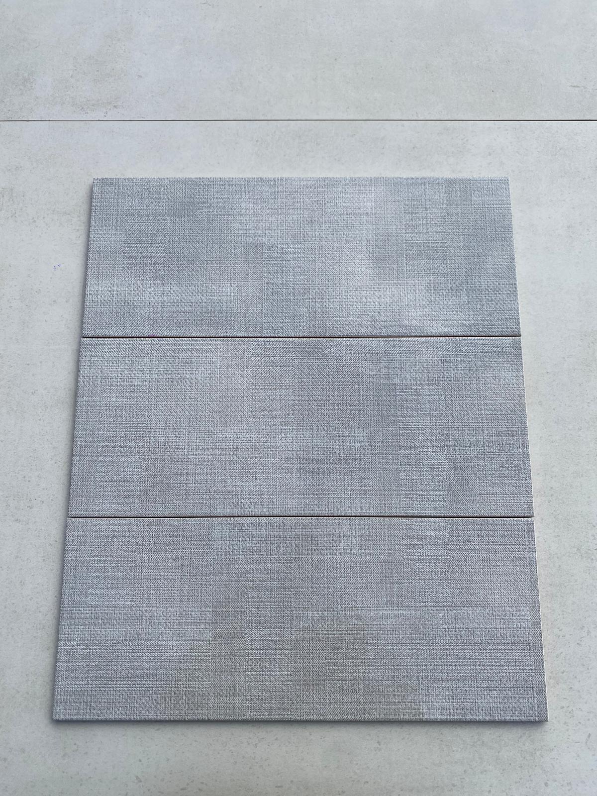 Piastrelle 20x50 Texture grigio glossy