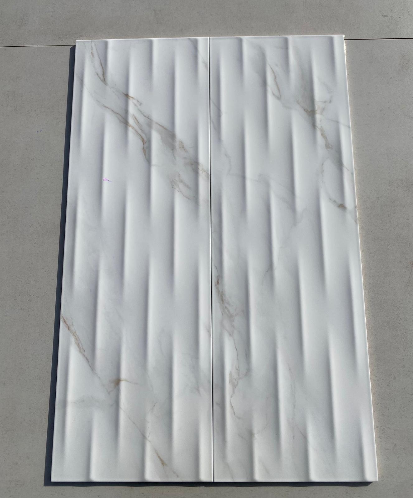 Piastrelle 25x75 Motif Extra calacatta gold lucido in rilievo