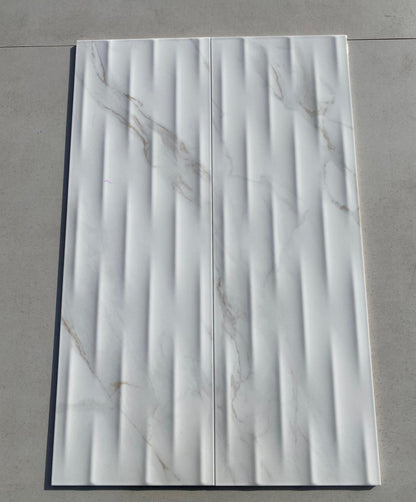 Piastrelle 25x75 Motif Extra calacatta gold lucido in rilievo
