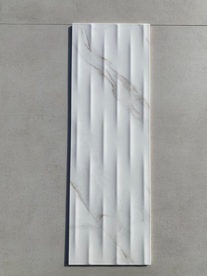 Piastrelle 25x75 Motif Extra calacatta gold lucido in rilievo